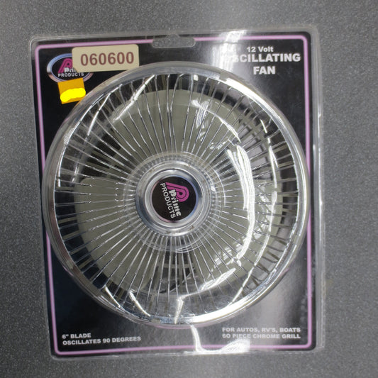 12 Volt oscillating fan in packaging on a gray background