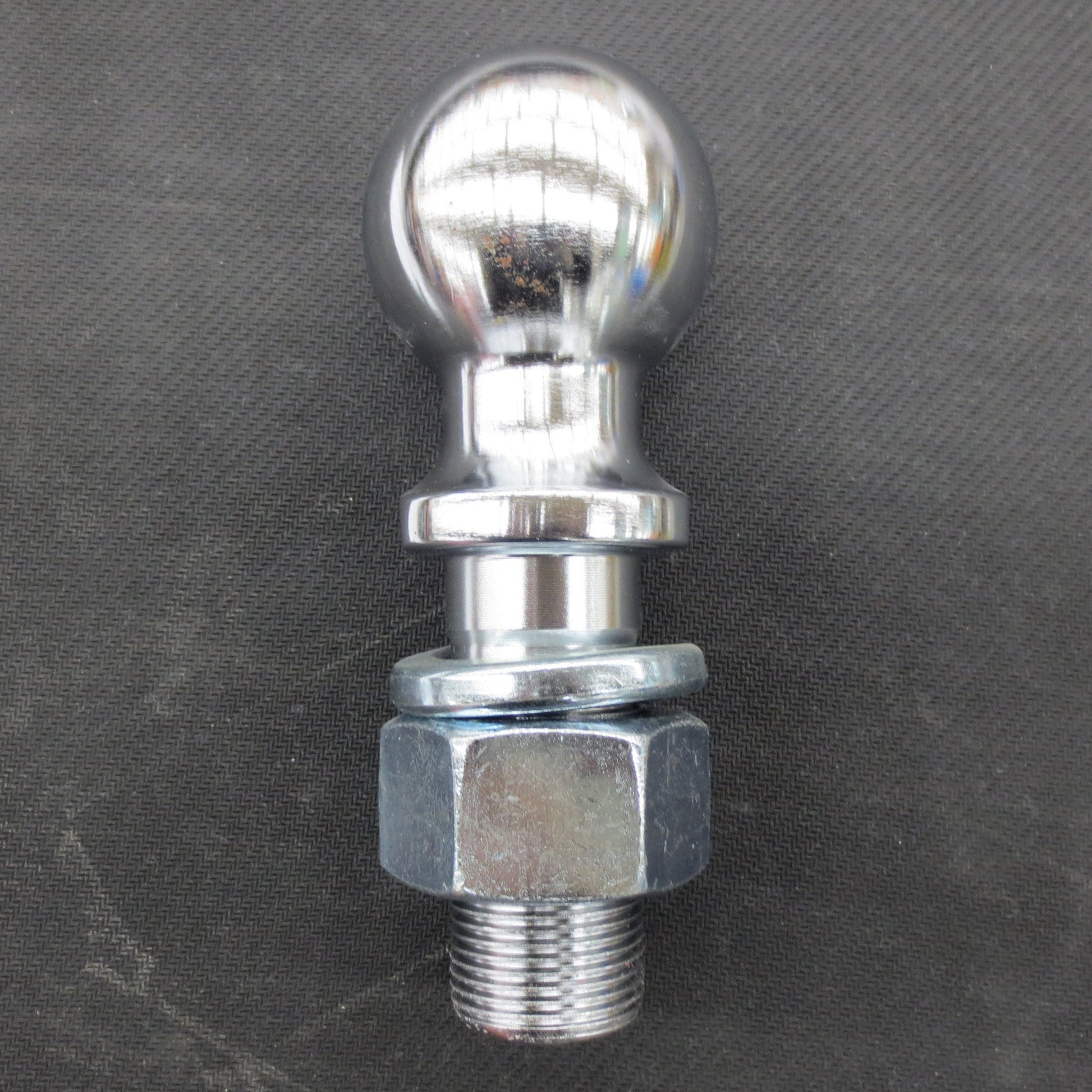 Chrome ball hitch on a gray background